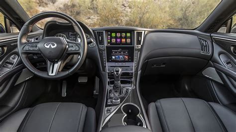 Each is available in a choice of rear-wheel or all-wheel drive. . Infiniti q60 red sport interior